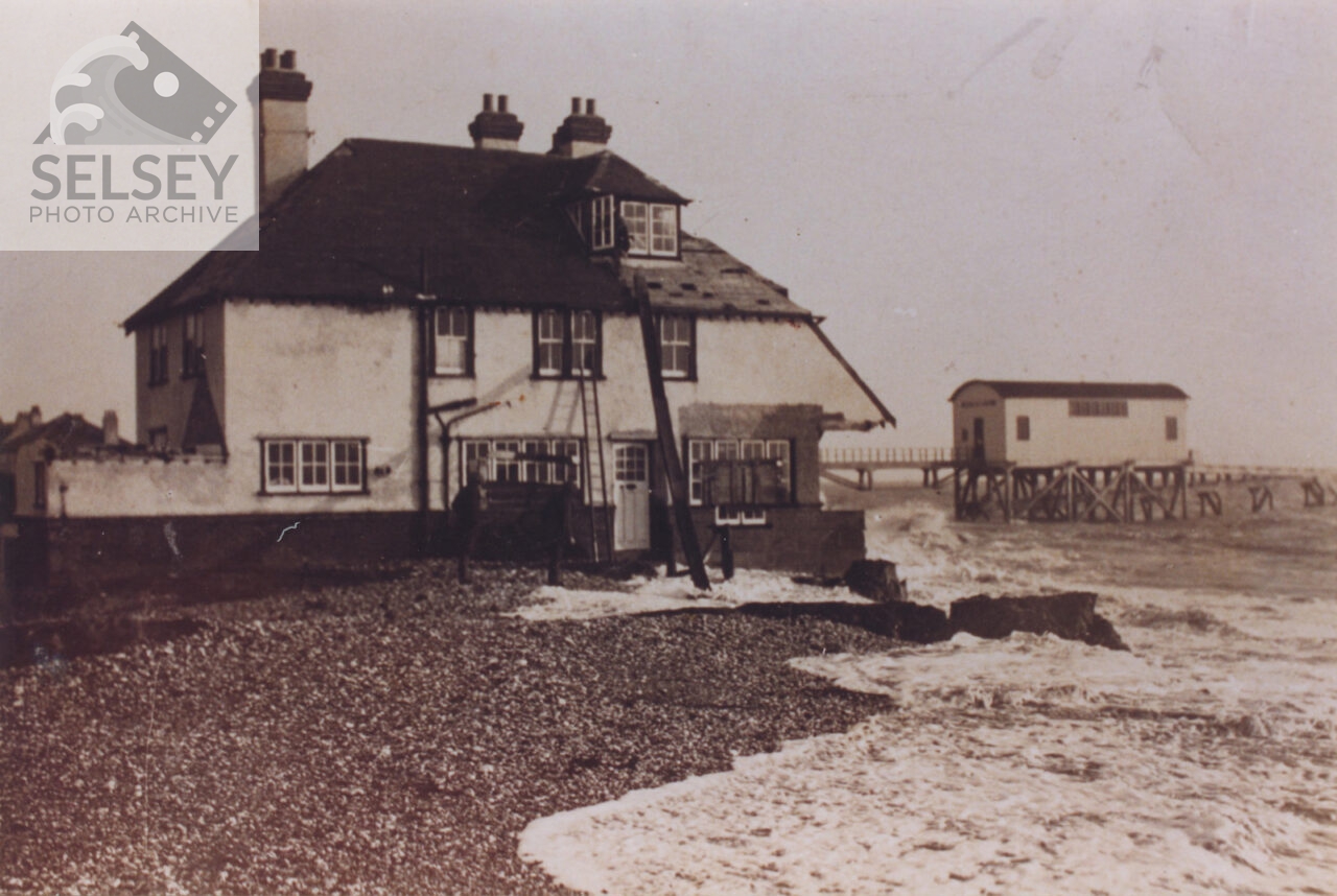 House on beach - featured image