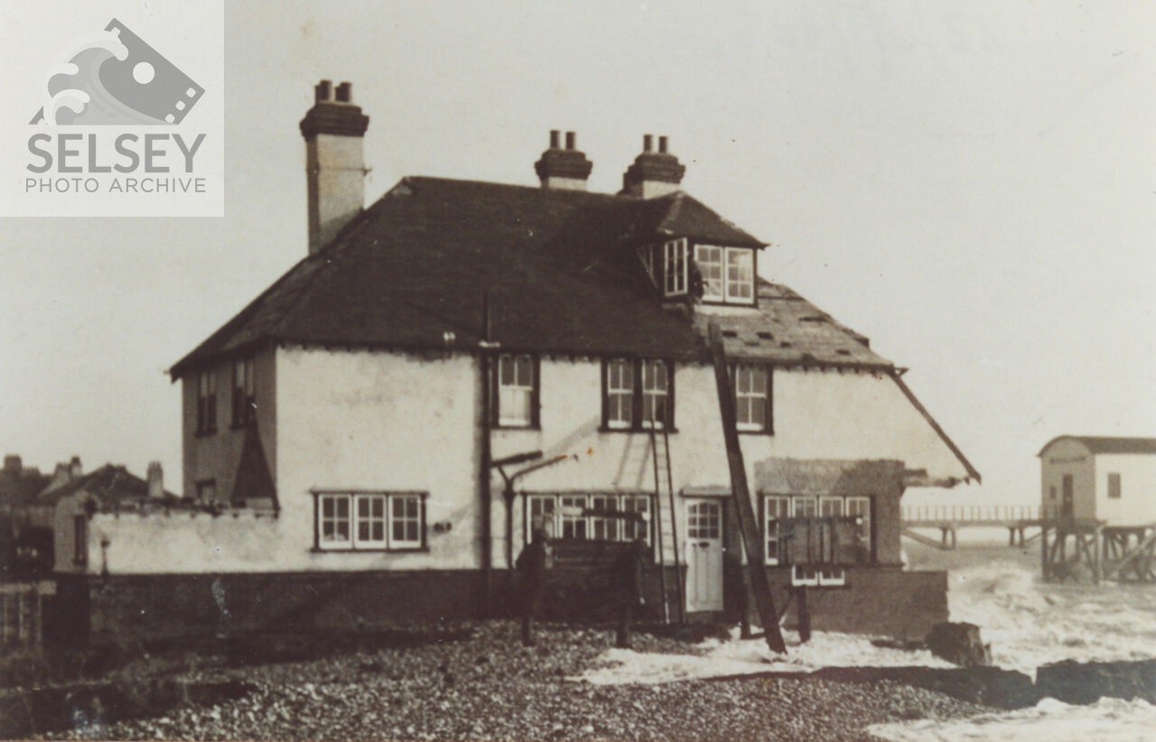 House being washed away - featured image
