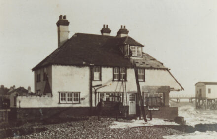 House being washed away - thumbnail image