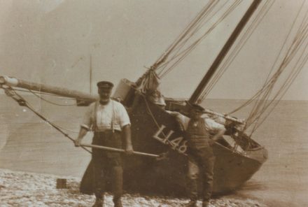 Selsey: Fisherman with boat on beach - thumbnail image