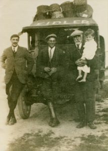 Fidler family in front of their truck - thumbnail image