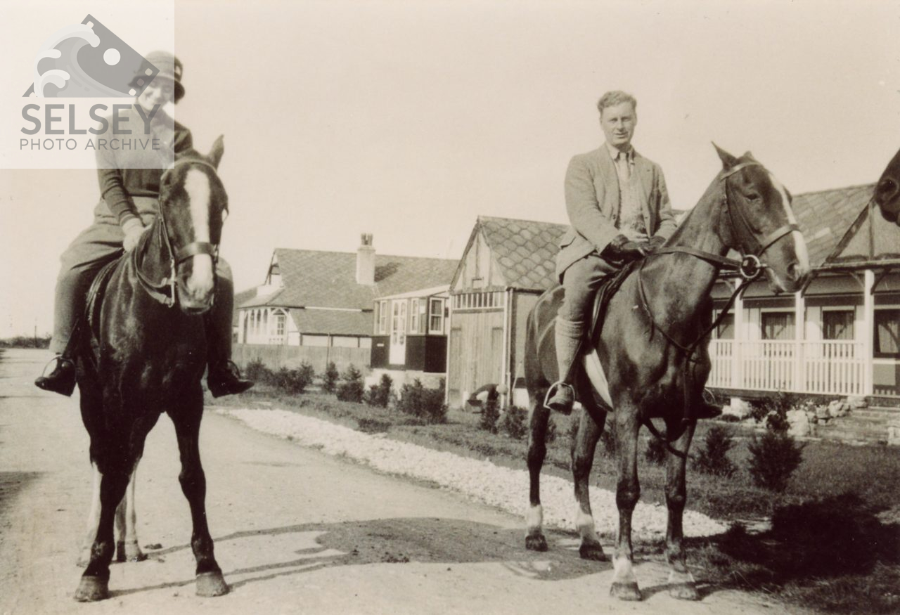 A pair of horse riders in Park Lane - featured image