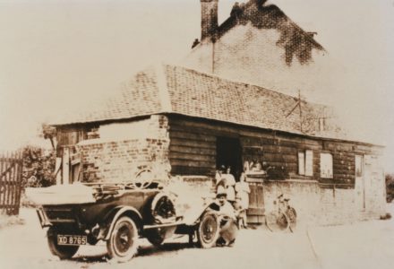 Car and people outside old forge in West Street - thumbnail image
